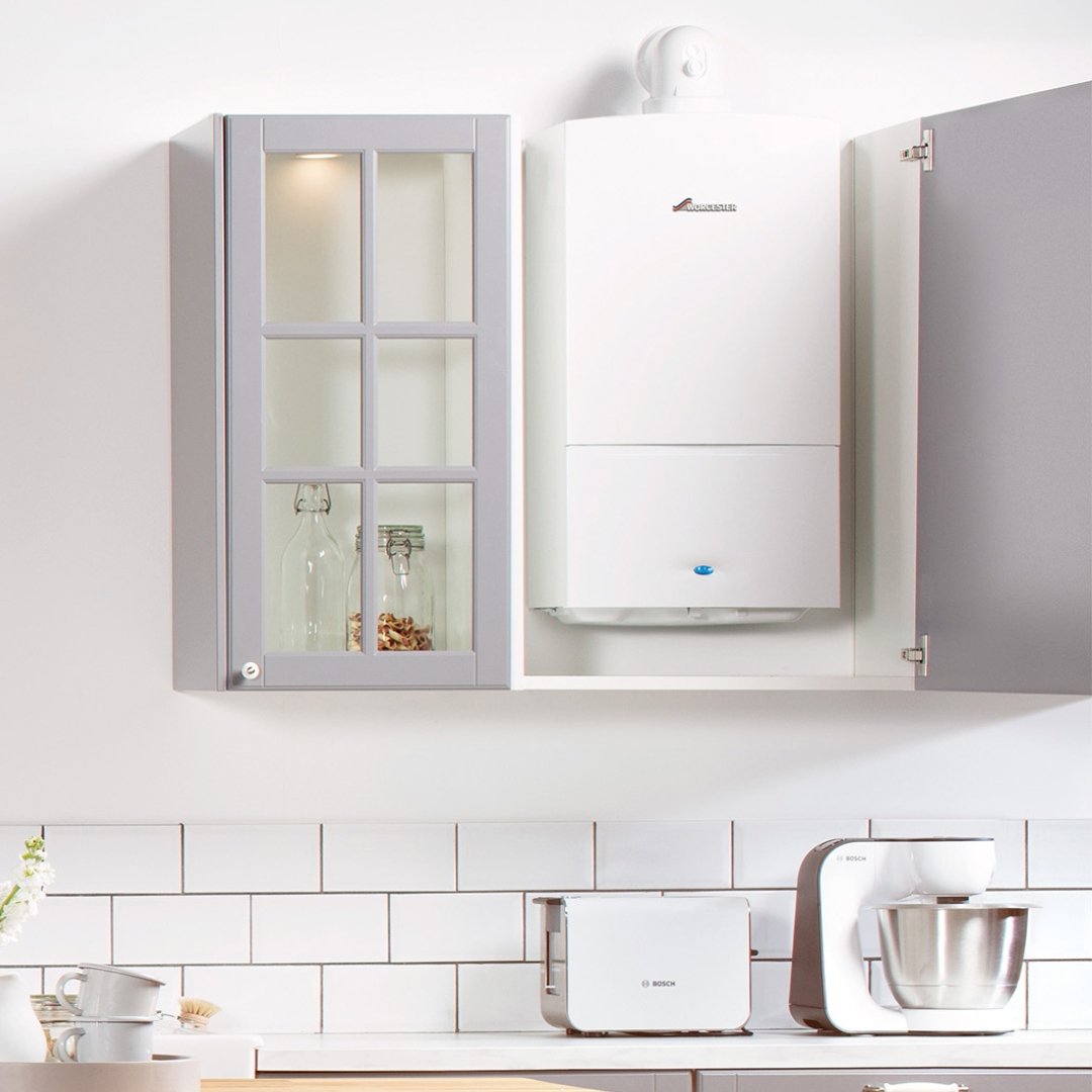 WORCESTER BOSCH boiler in the kitchen cupboard