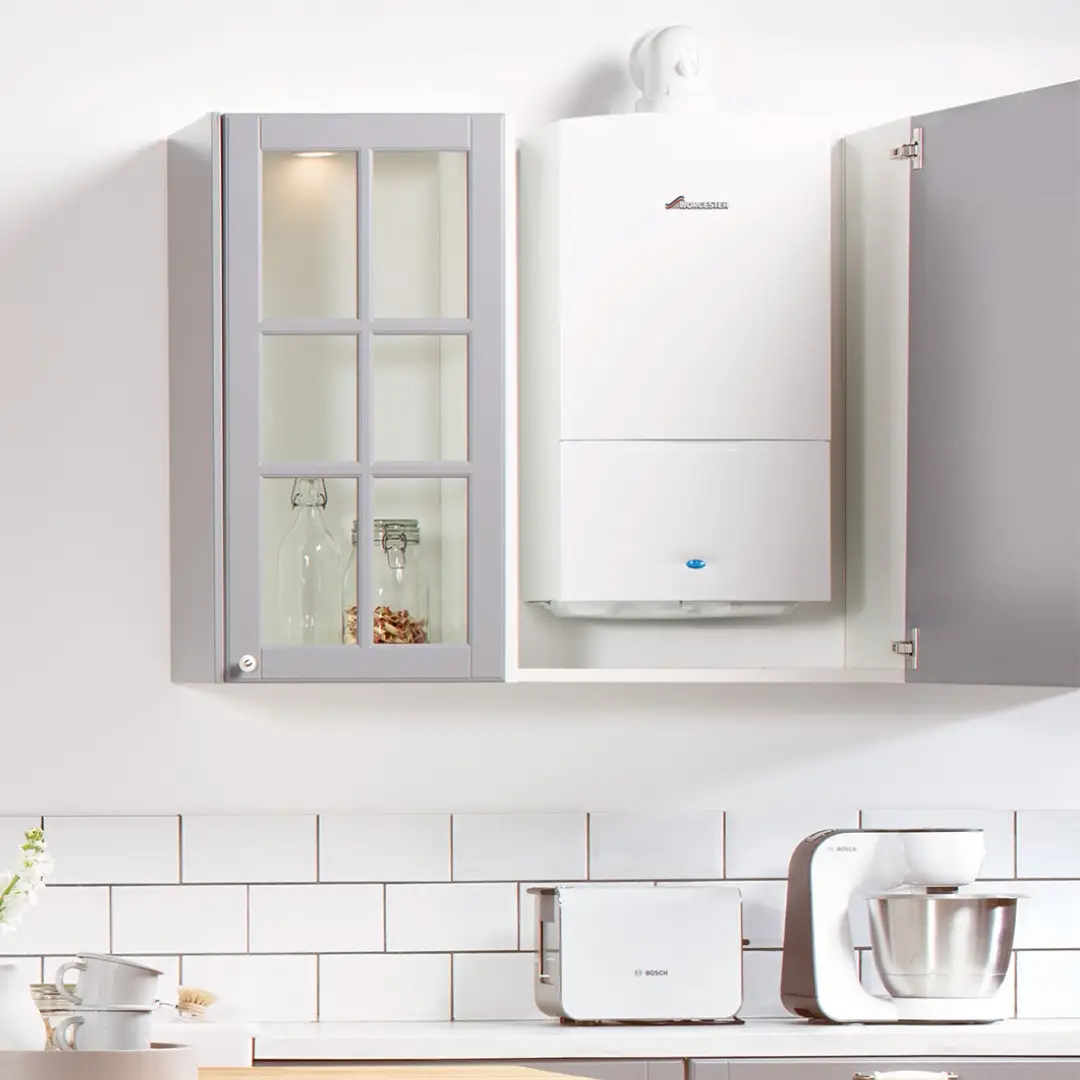 WORCESTER BOSCH boiler in the kitchen cupboard